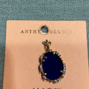 Anthropologie Navy and  antique Gold Oval Pendant with zirconias.